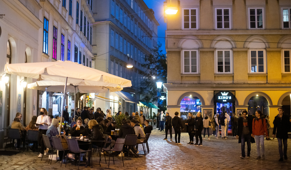 People enjoy an evening drink at Bermuda Triangle